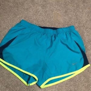 Yellow and blue nike tempo running shorts